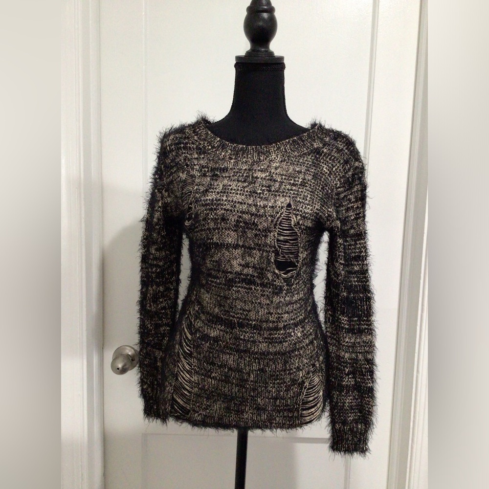 Beige and black long sleeve shirt